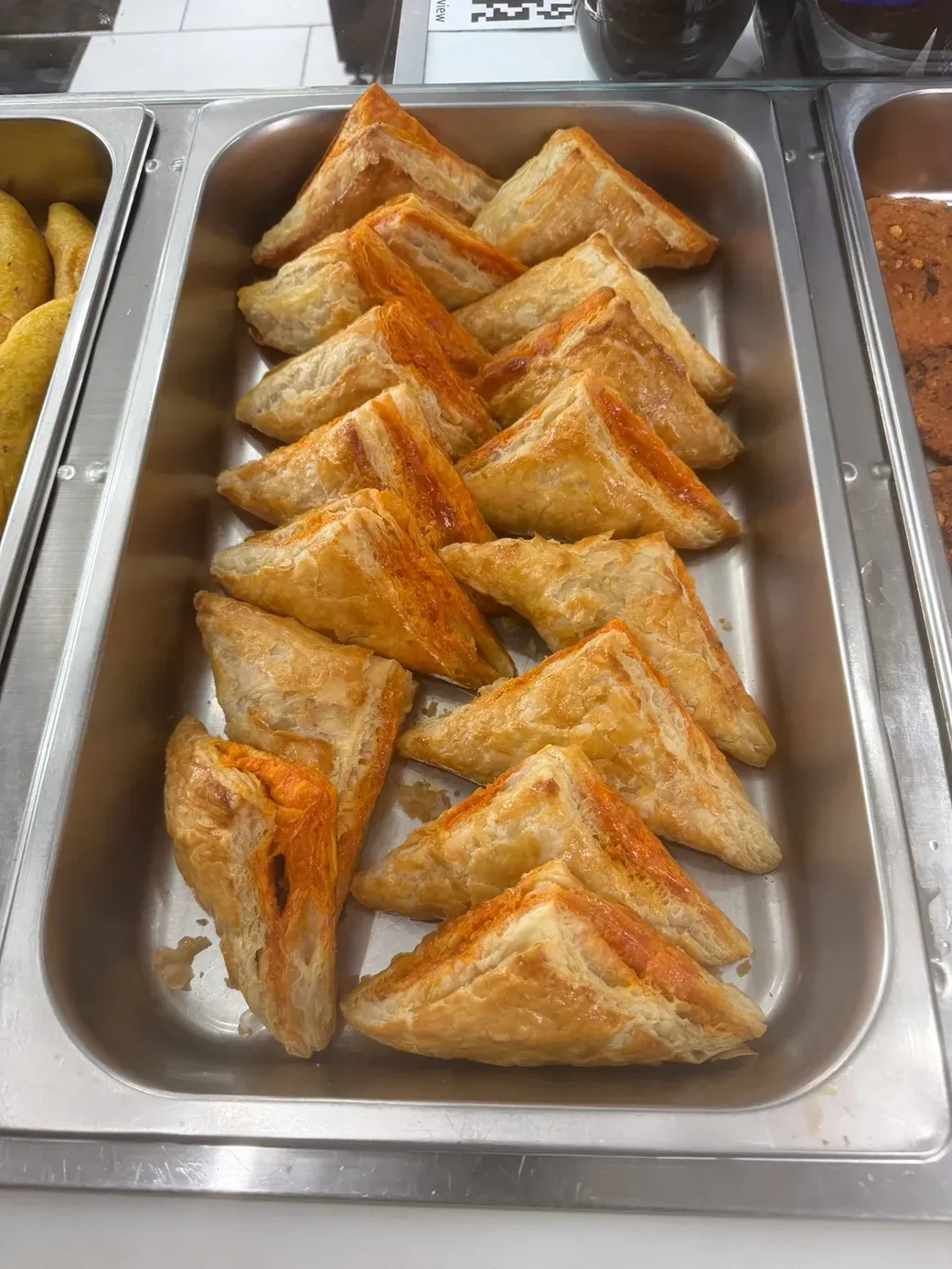 Vegetable Puff - Flaky pastry with spiced vegetable filling at Chilli Flakes